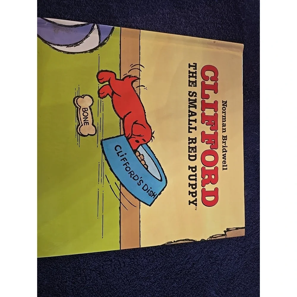 Clifford the Small Red Puppy‎ by Norman Bridwell